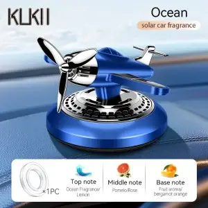 Solar powered rotating fighter car air freshener